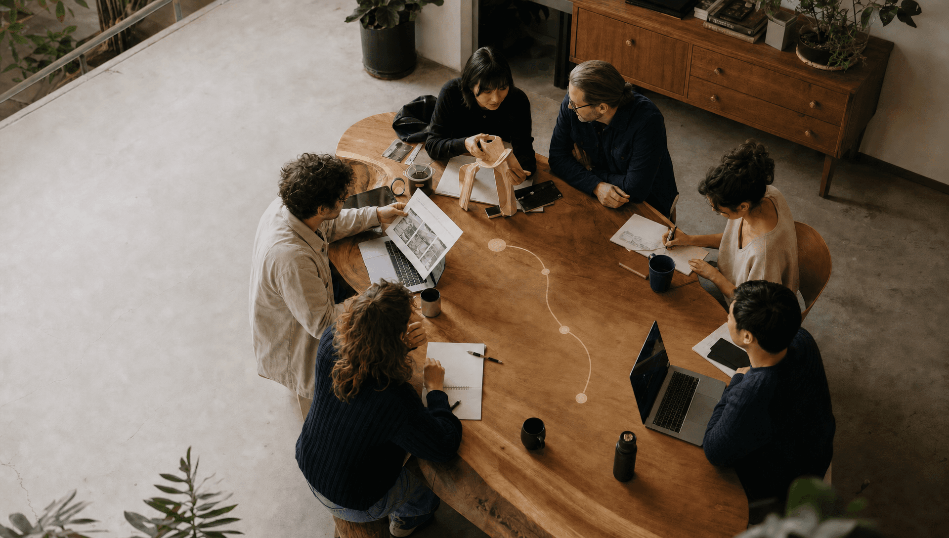 A cross-functional team working together around a goal path